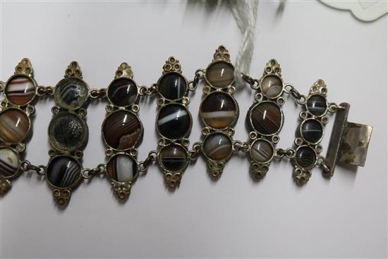 Two banded agate bracelets, one in gilt metal, one in white metal.